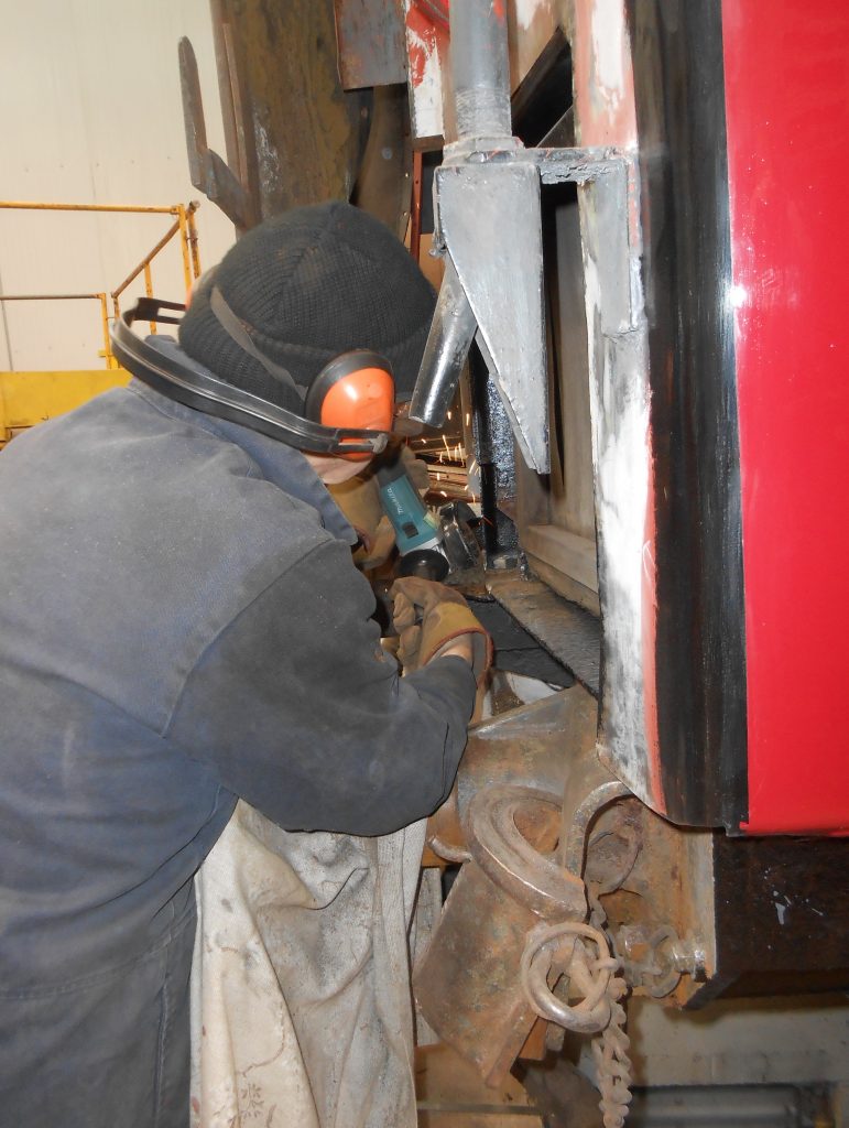 John grinding down weld