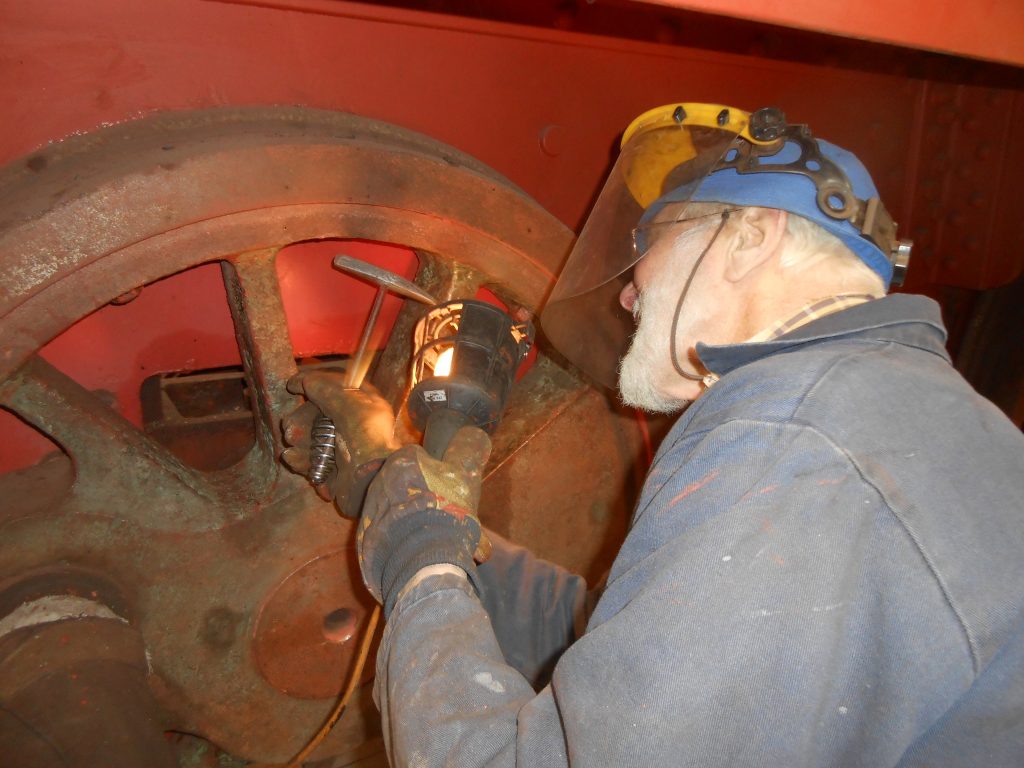 Roger chipping away at a spoke