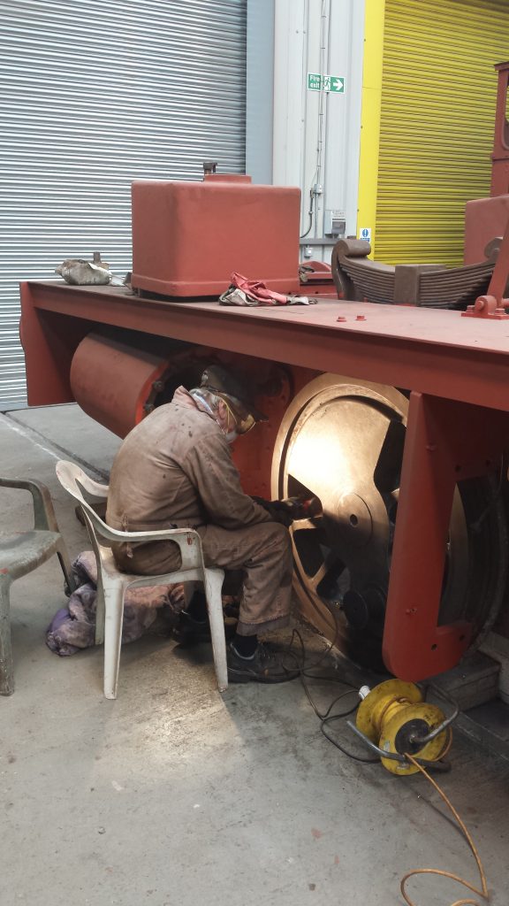 Fred at work on Caliban's wheels