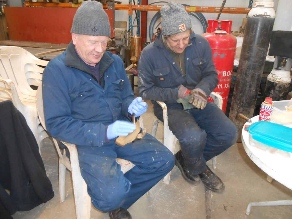 Paul and Mike cleaning brass carriage grab handles