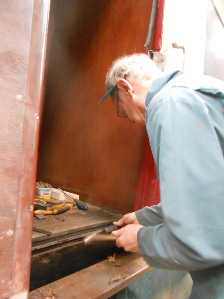 John attacking the rot at another door entrance