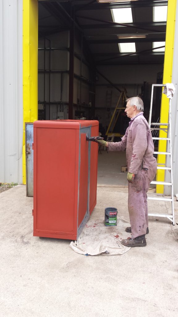 The paint cabinet receiving some, er, paint