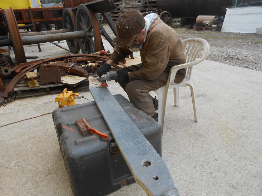 Fred cleaning one of Wootton Hall's brake beams