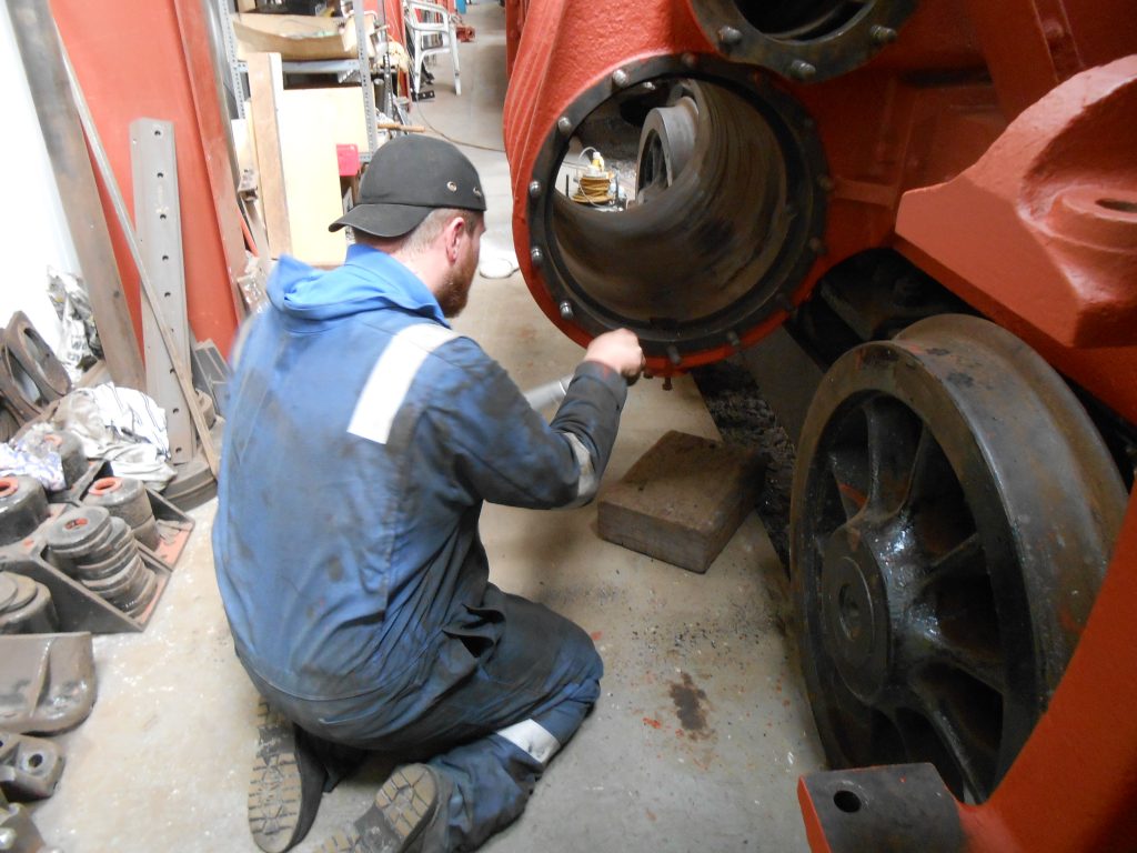 Matt Bedford running a die nut down Wootton Hall's studs for the left hand cylinder