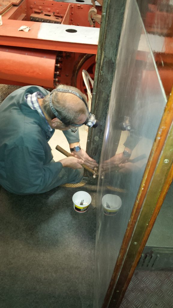 John attending to yet more panelling adjacent to a door