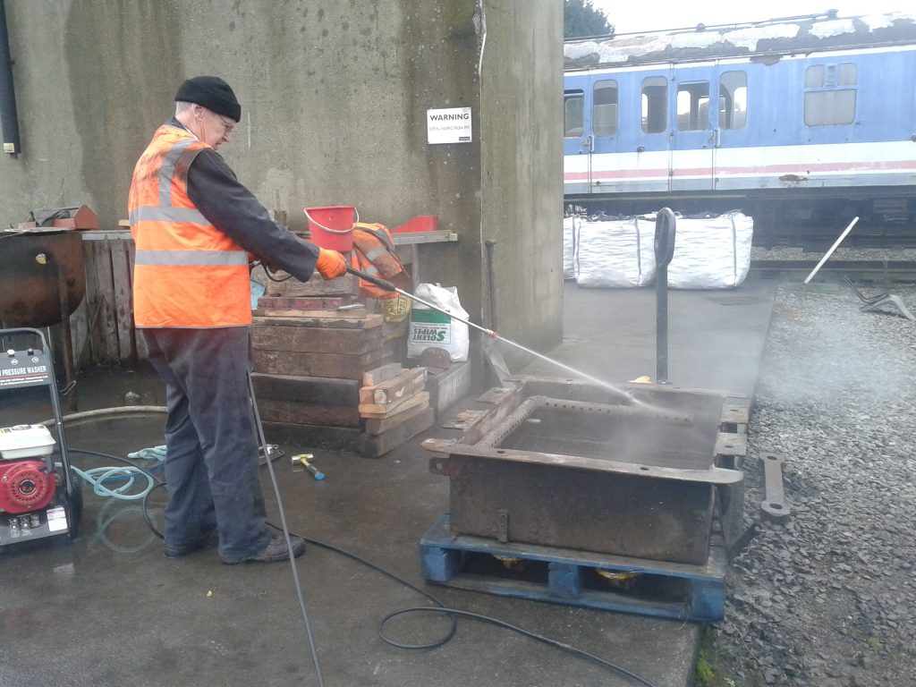 John tries out the new power washer on the ashpan