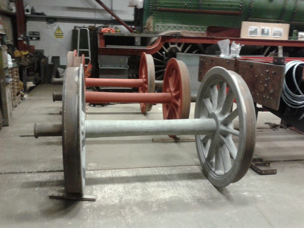 The Hall's tender wheels in the shed after grit blasting with red oxide having been applied to two wheelsets