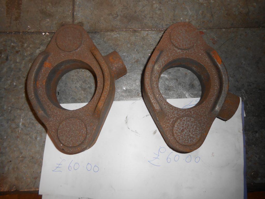 Two new rear valve head cover glands castings - £60 each.