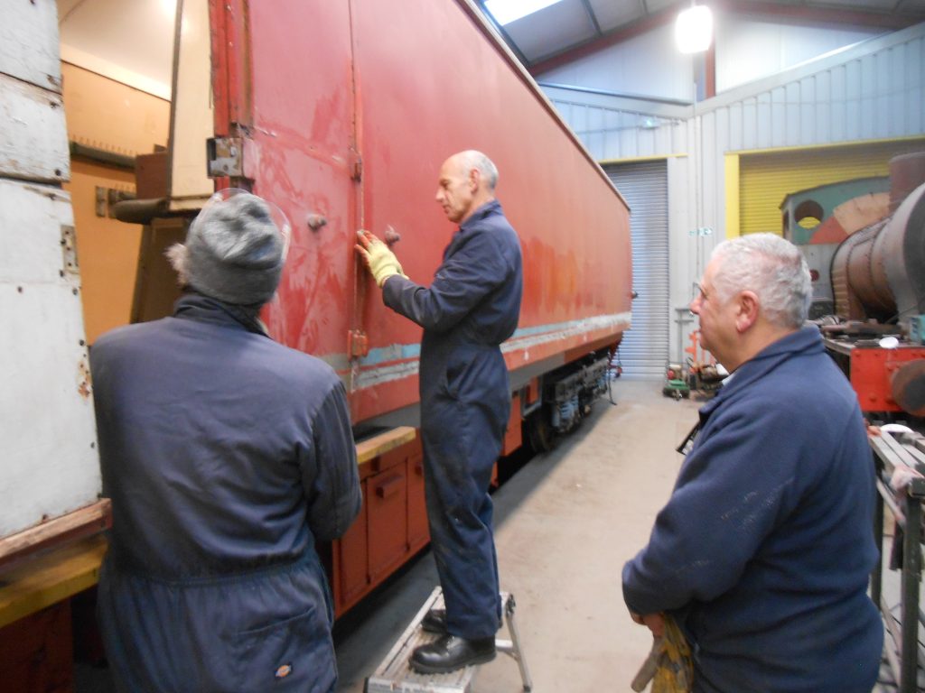 Andy Morton works on the TPO watched by statutory onlookers