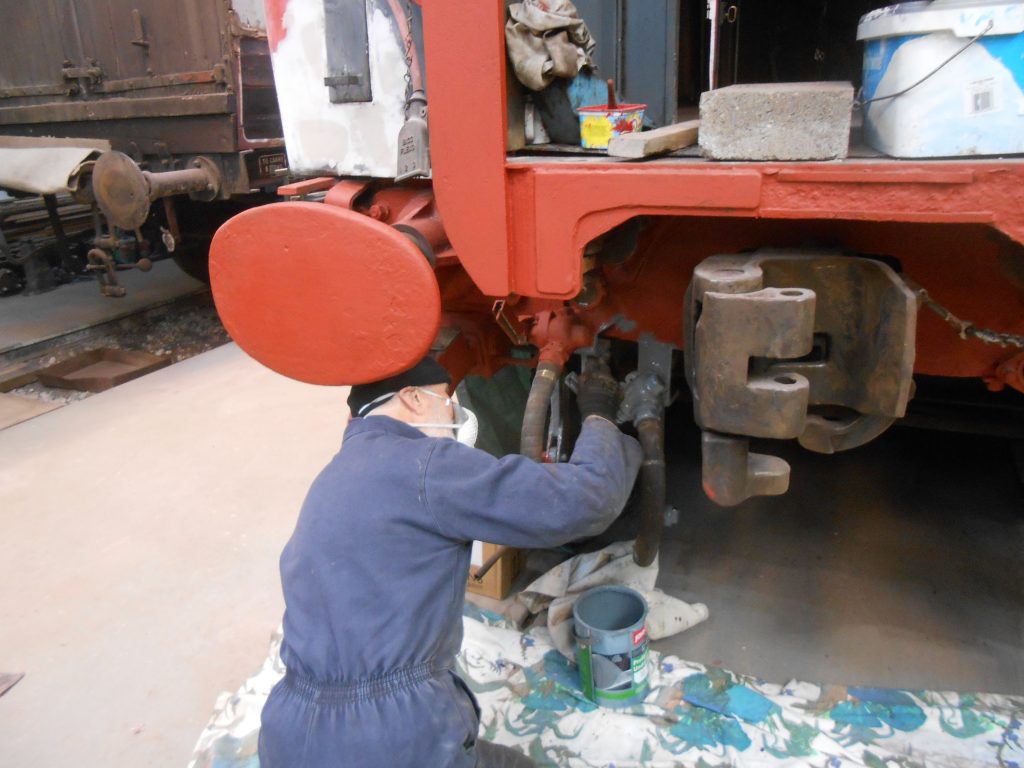 Roger Benbow painting the west end headstock on the TPO