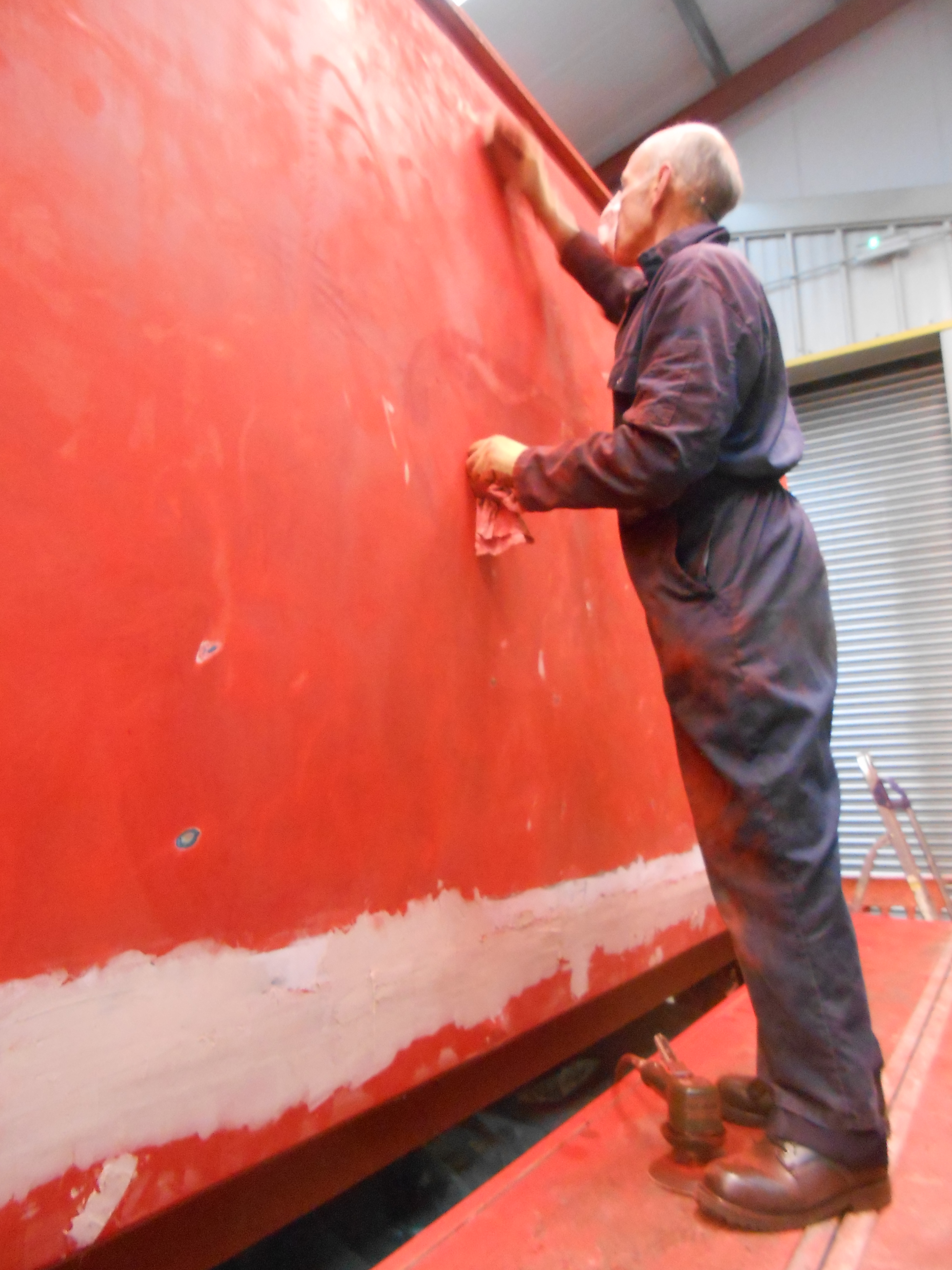 Andy Morton sanding the TPO coach