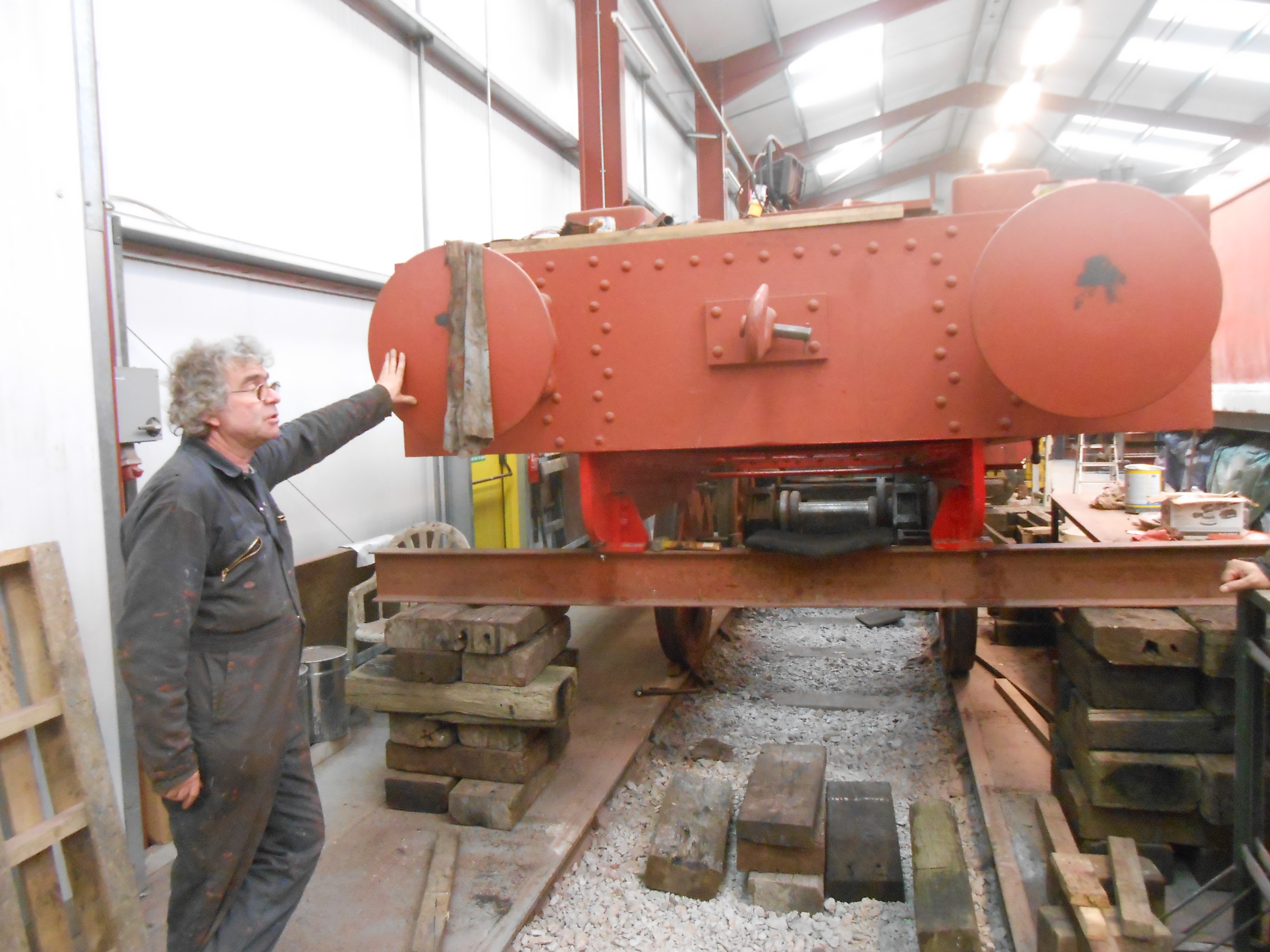 Ade holding Caliban's frames in place