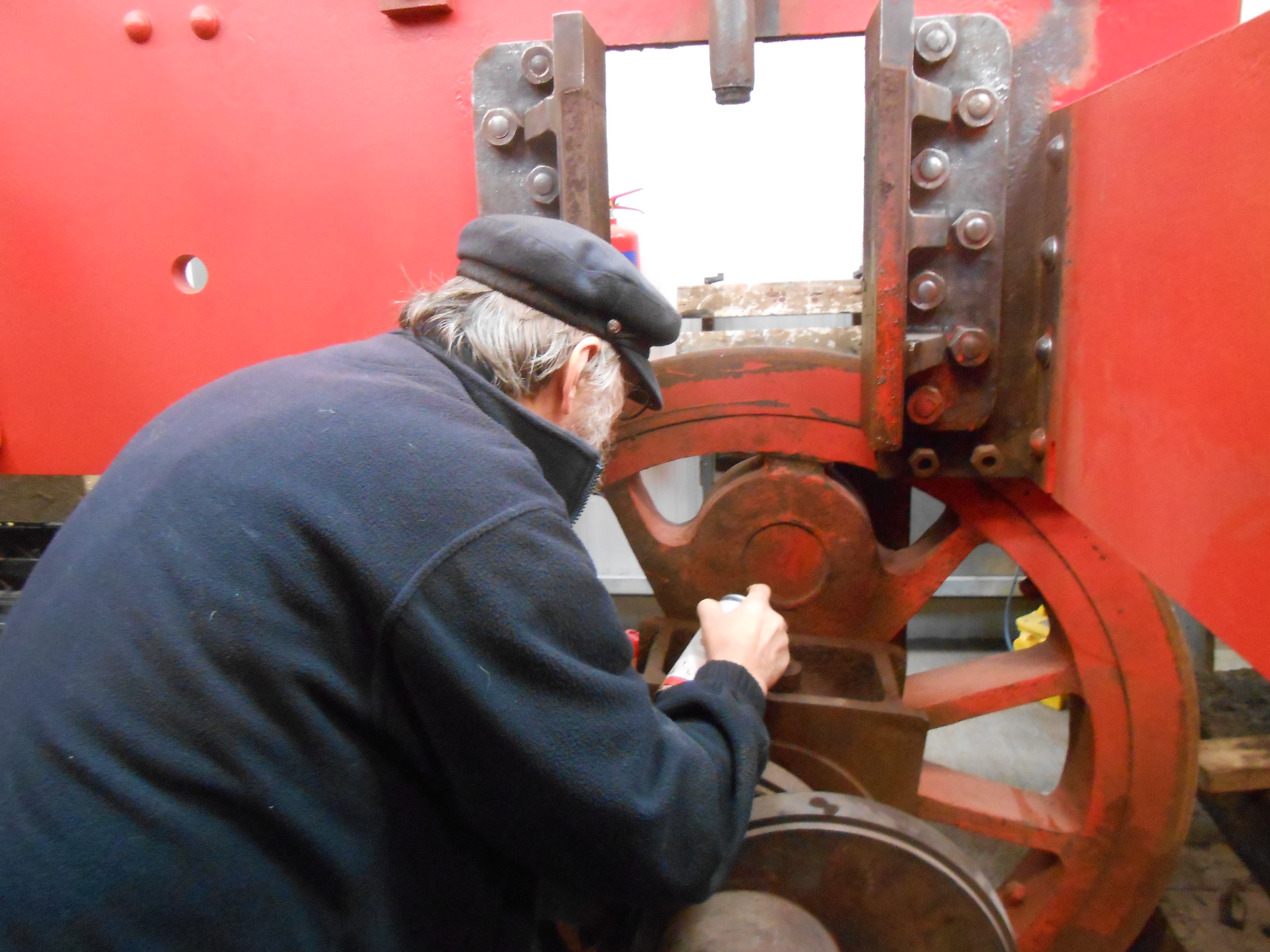 Alan sprays some release oil on to an axlebox