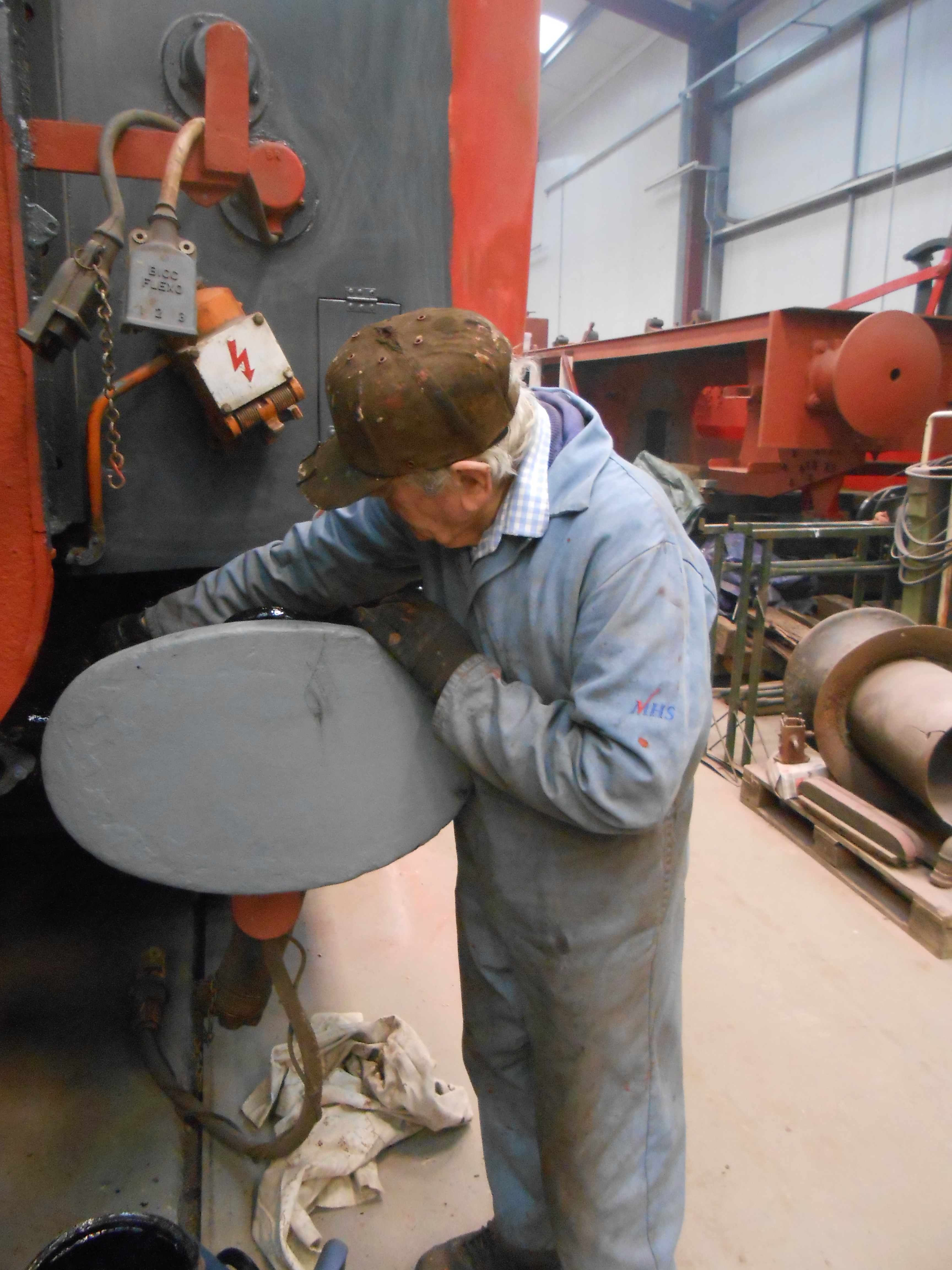 Fred painting one of the TPO headstocks