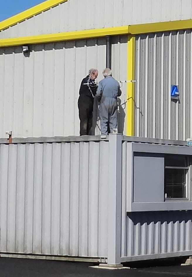 John and Fred fixing a new aerial above the mess room 200418