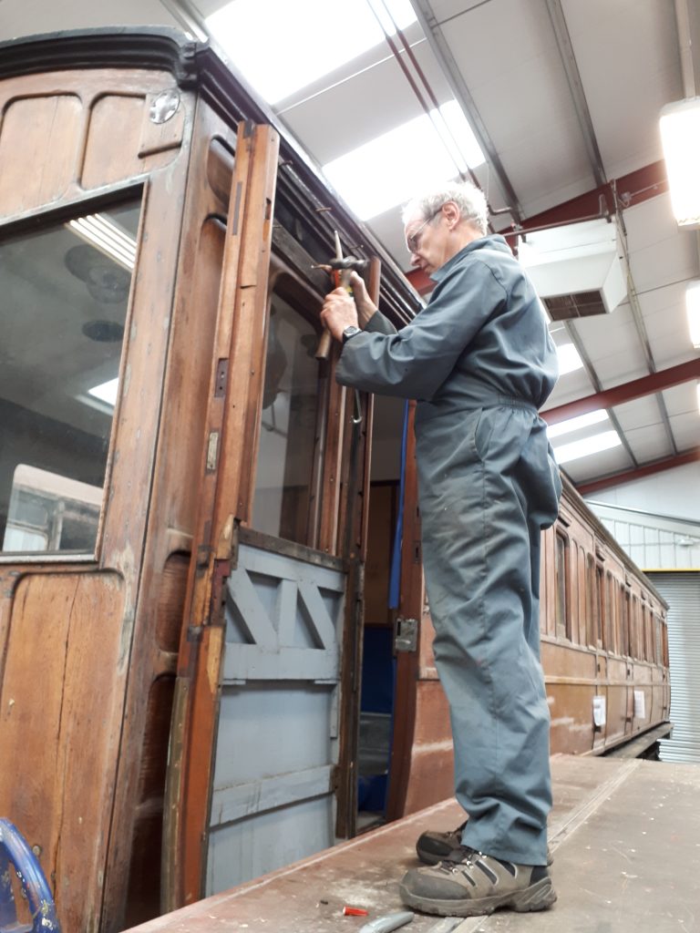 John Dixon repairing a door on GER 5