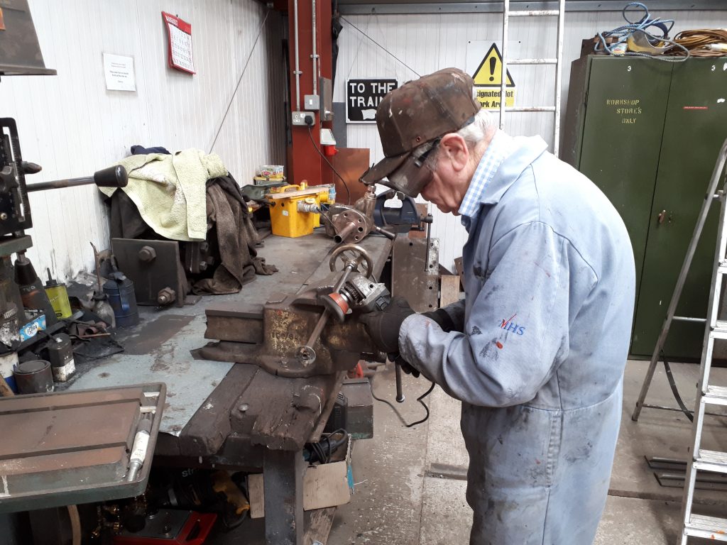 Fred cleaning one of FR 20 injector steam valve handles