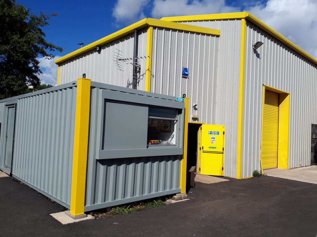 The corner posts on the cabin in the correct shade of yellow