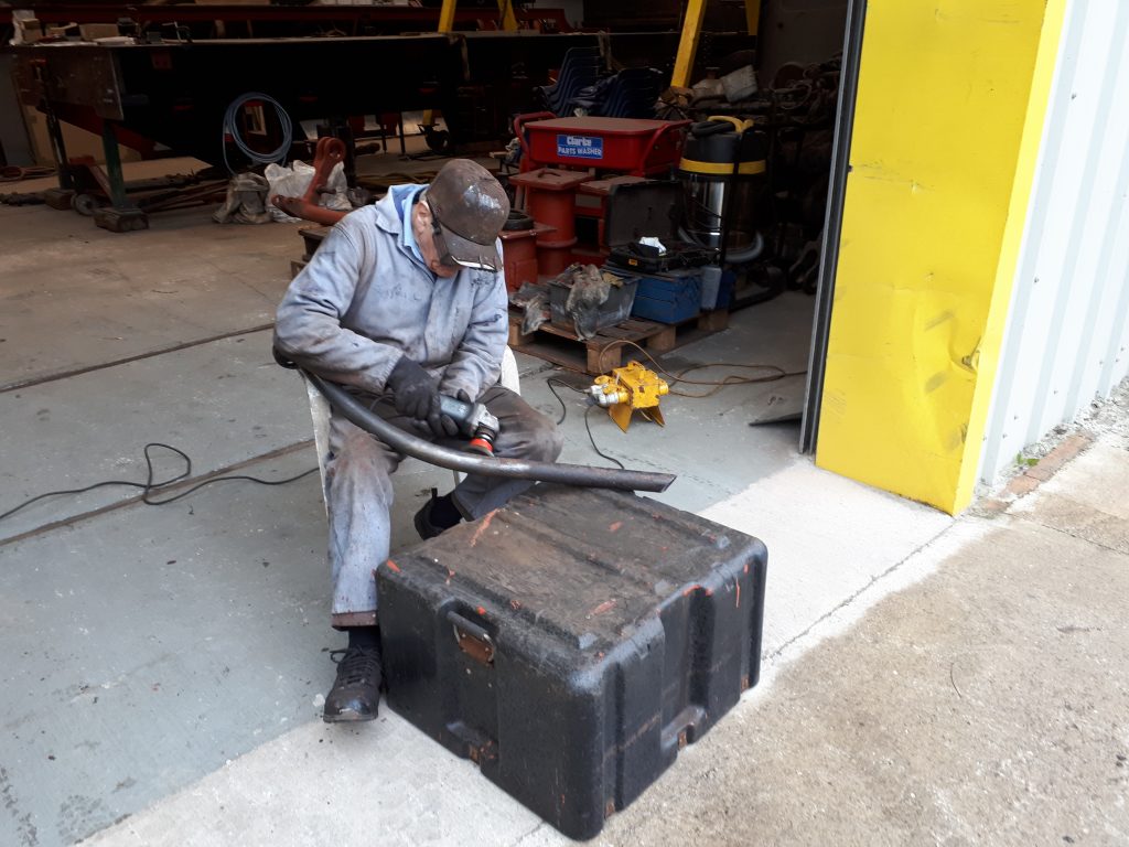 Fred cleans up one of FR 20's sand pipes