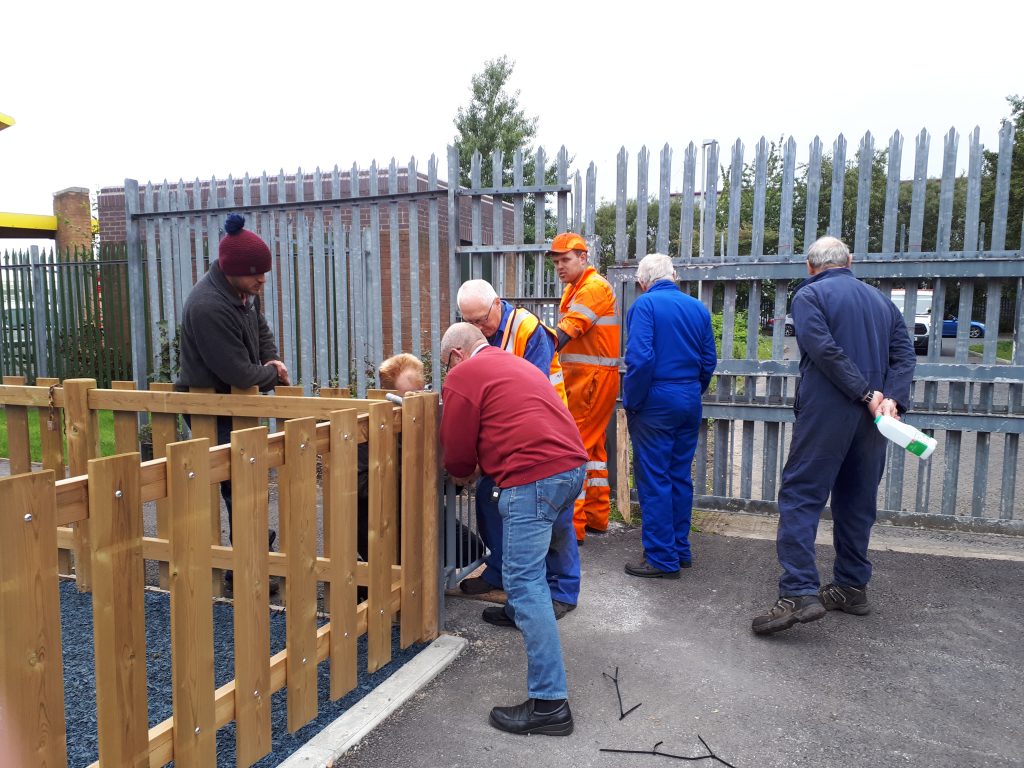 Seven people and a gate