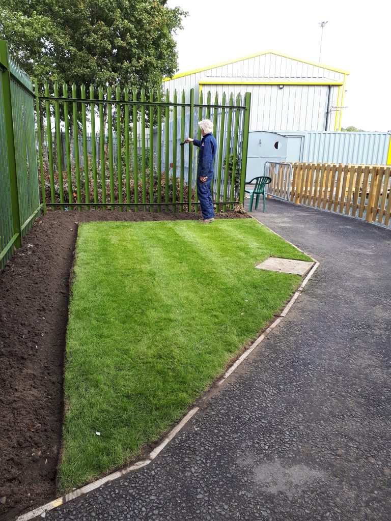 Ted finishing the paintwork around the new garden