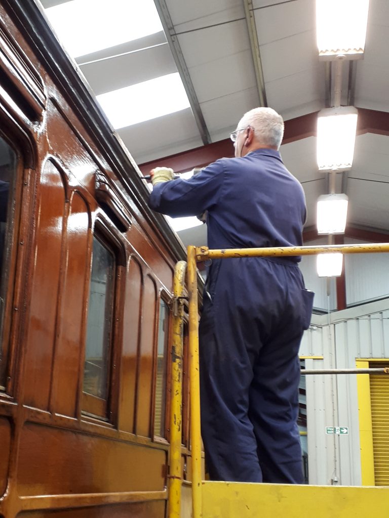 John Davis working on the gutter of the GER Royal Saloon