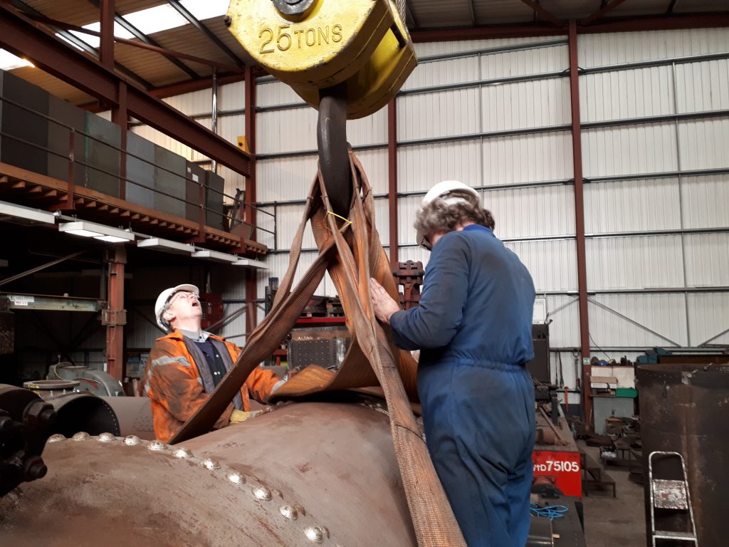 John and Ade arrange the lifting straps on FR 20's boiler