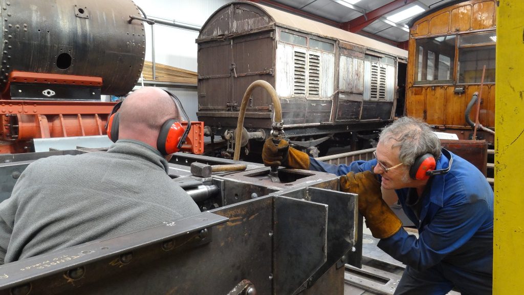 Matt Gervis and Keith Brewer riveting Wootton Hall's tender frames