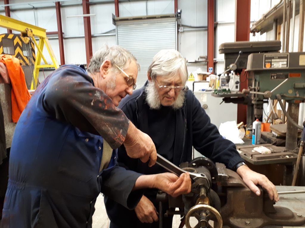 Keith and Alan with Cumbria's fireman's side clack box