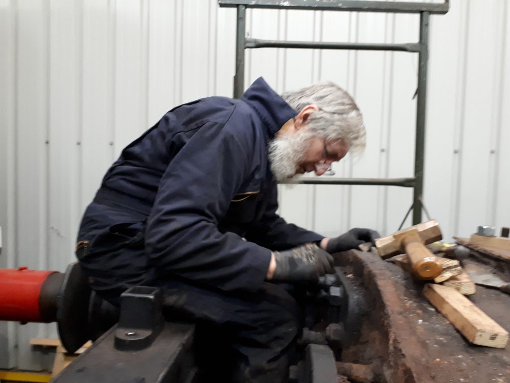 Alan prising off the right hand cylinder cover on FR 20