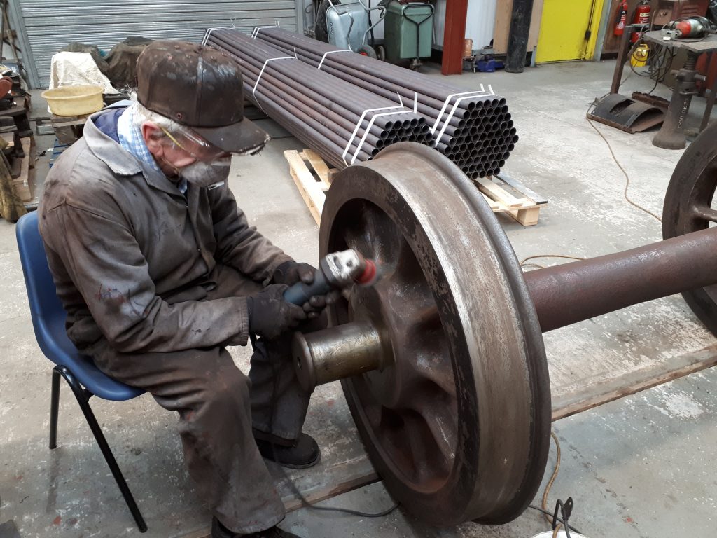 Fred cleans up one of FR 20's tender wheelsets