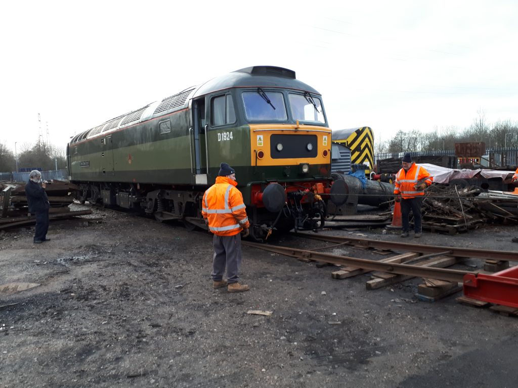 D1924 heads up the loading ramp at preston