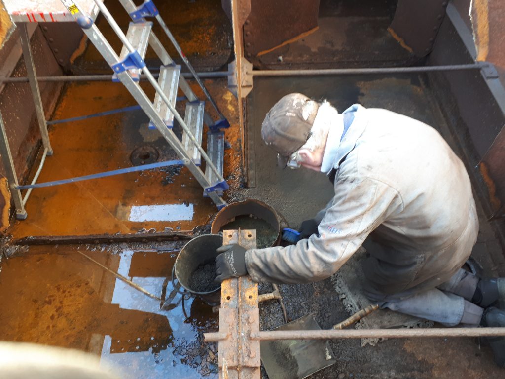Fred cleans scale out of Wootton Hall's tender tank
