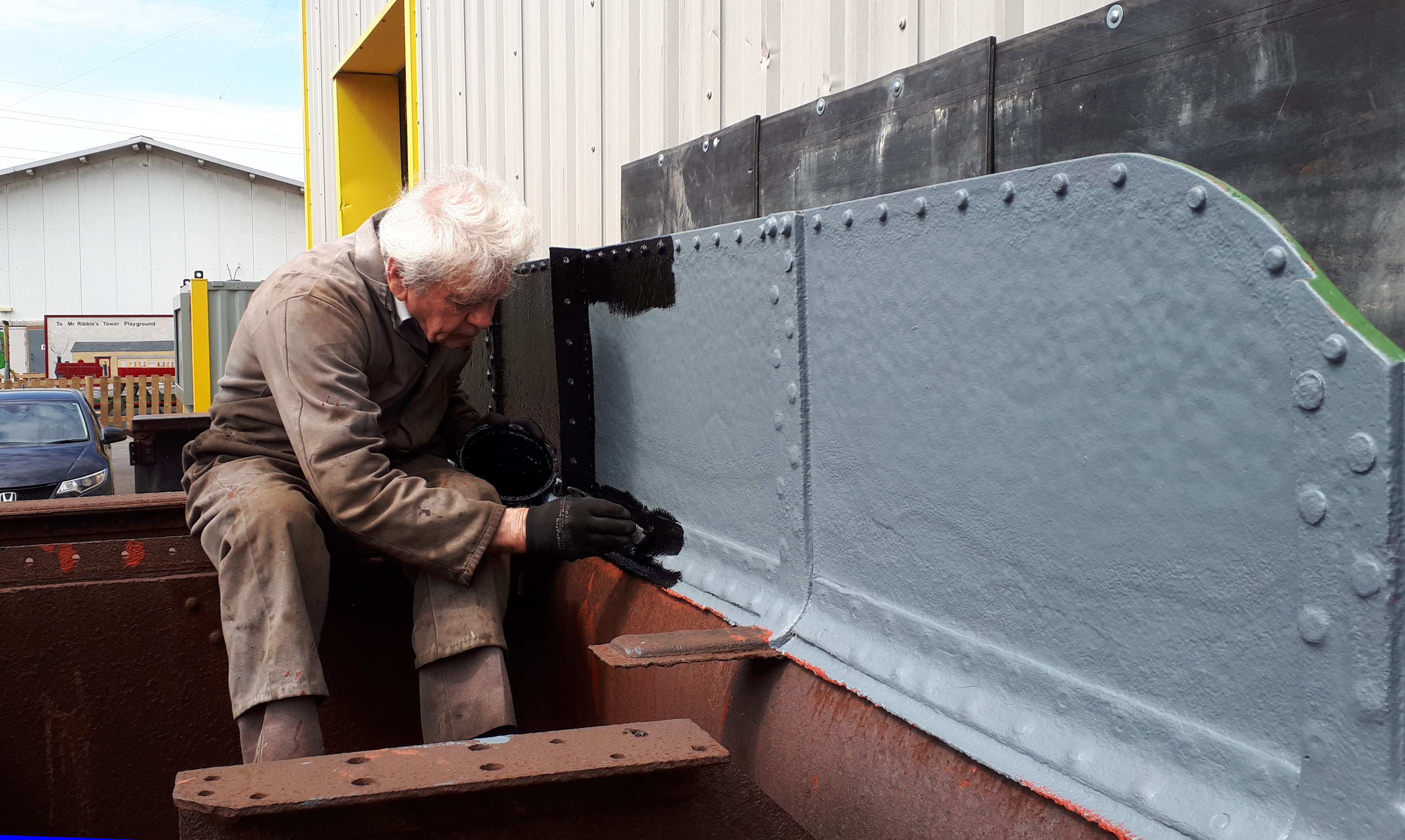 Fred paints the inside of Wootton Hall's new tender tank