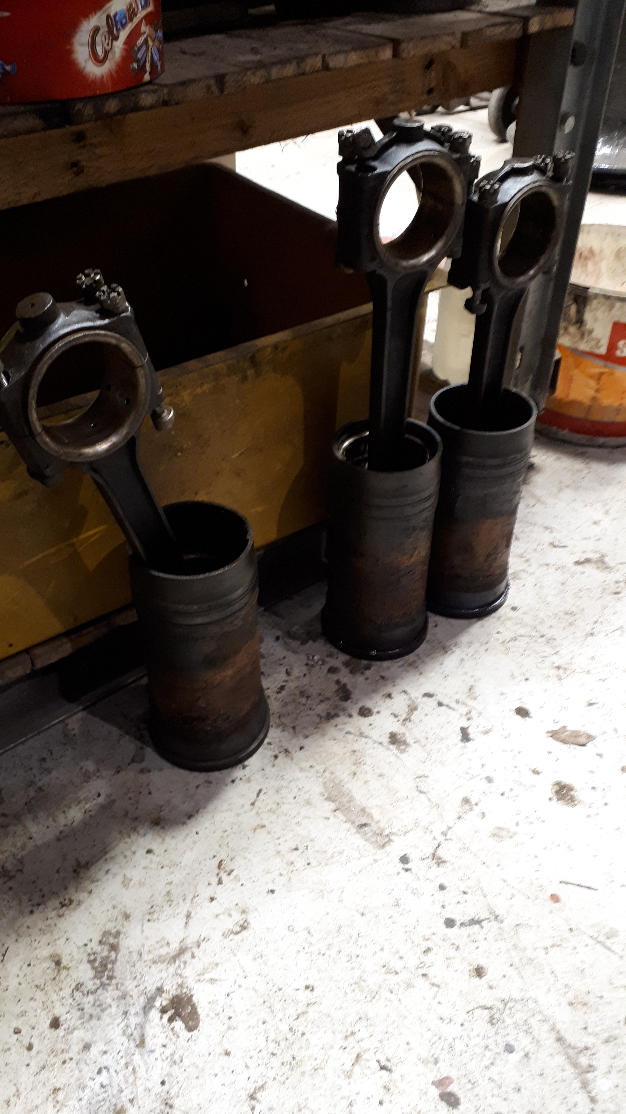 Three of Fluff's pistons to be removed from their liners