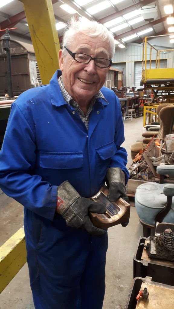 Bill Norcross with one of the machined bearings