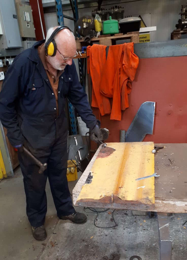 Phil Bell conserving one of Fluff's existing doors