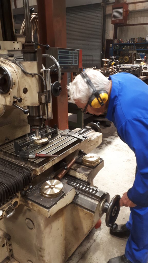 Bill Norcross preparing to drill holes in a brass flange for Wootton Hall