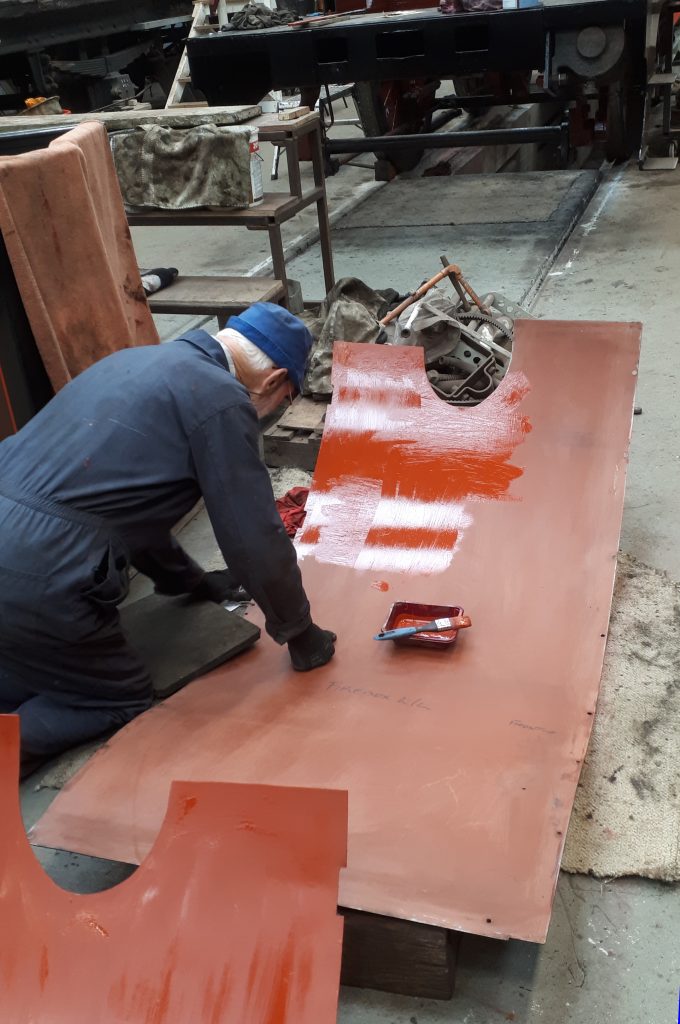 Roger painting the inside of FR 20's cladding