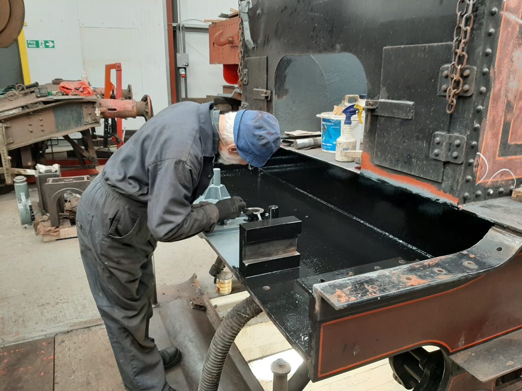 Roger painting the interior of FR 20's front tender drag box