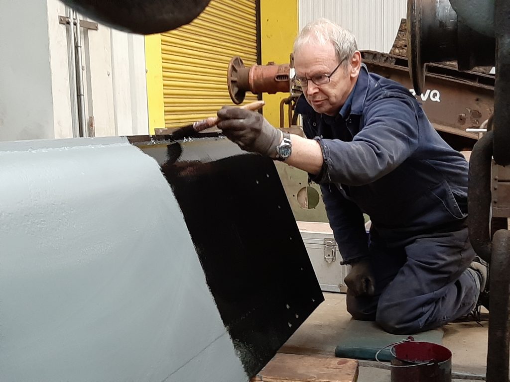 John Dixon puts black gloss on the bottom of the tender footplate floor