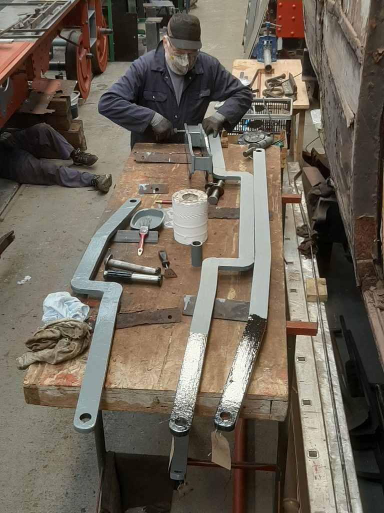 Phil Bell with a selection of FR 20's brake rigging for painting