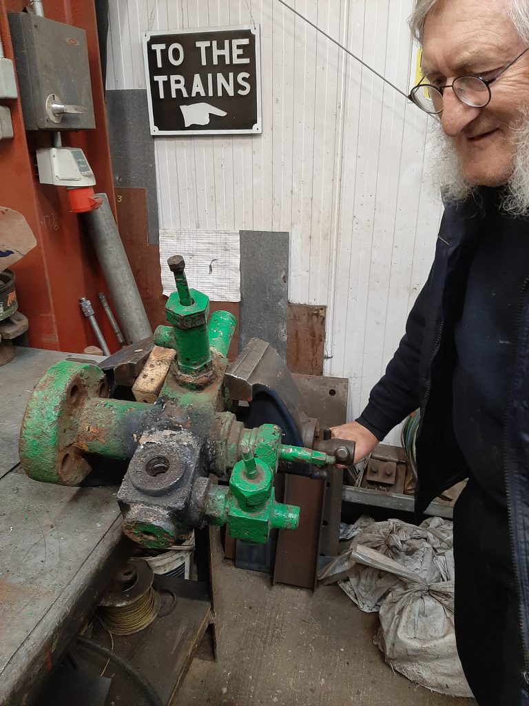 Alan sizes up the replacement manifold for Caliban