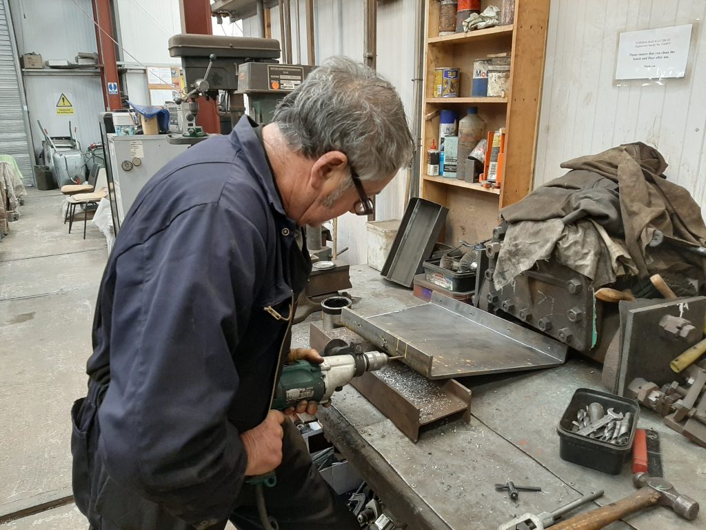 Keith drilling one of Wootton Hall's tender footplate floor supports