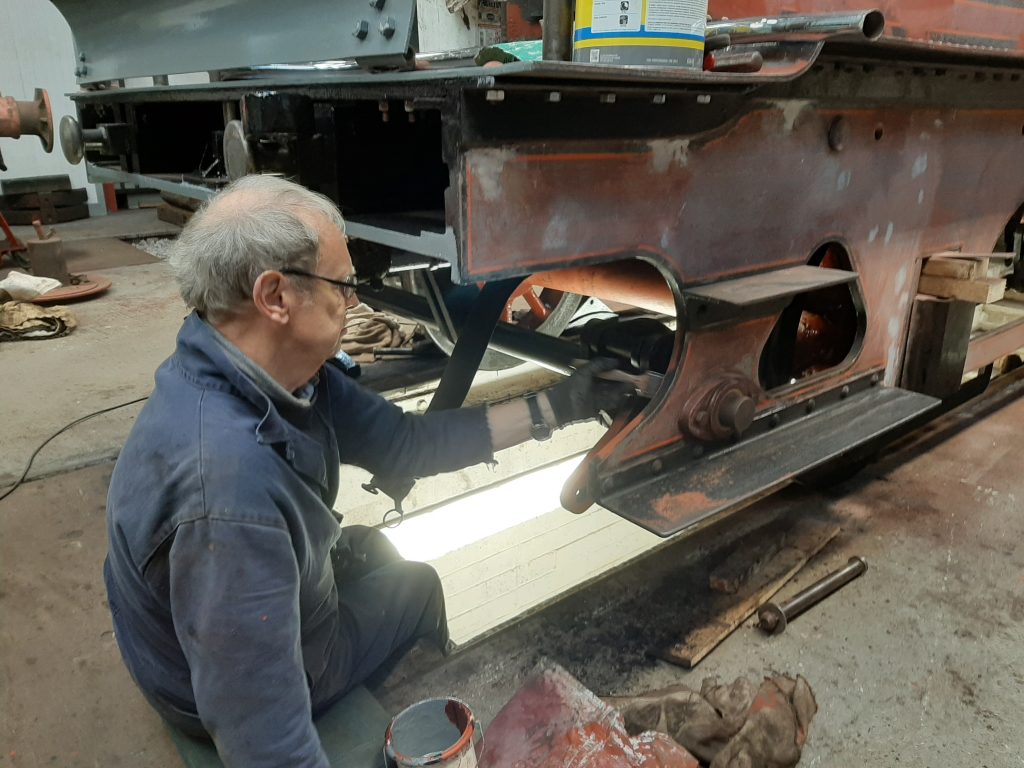 John Dixon painting the inside of FR 20's tender frames