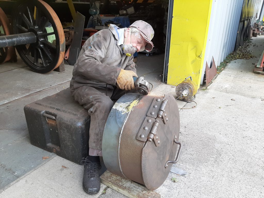 Fred cleaning up Wootton Hall's tender filler