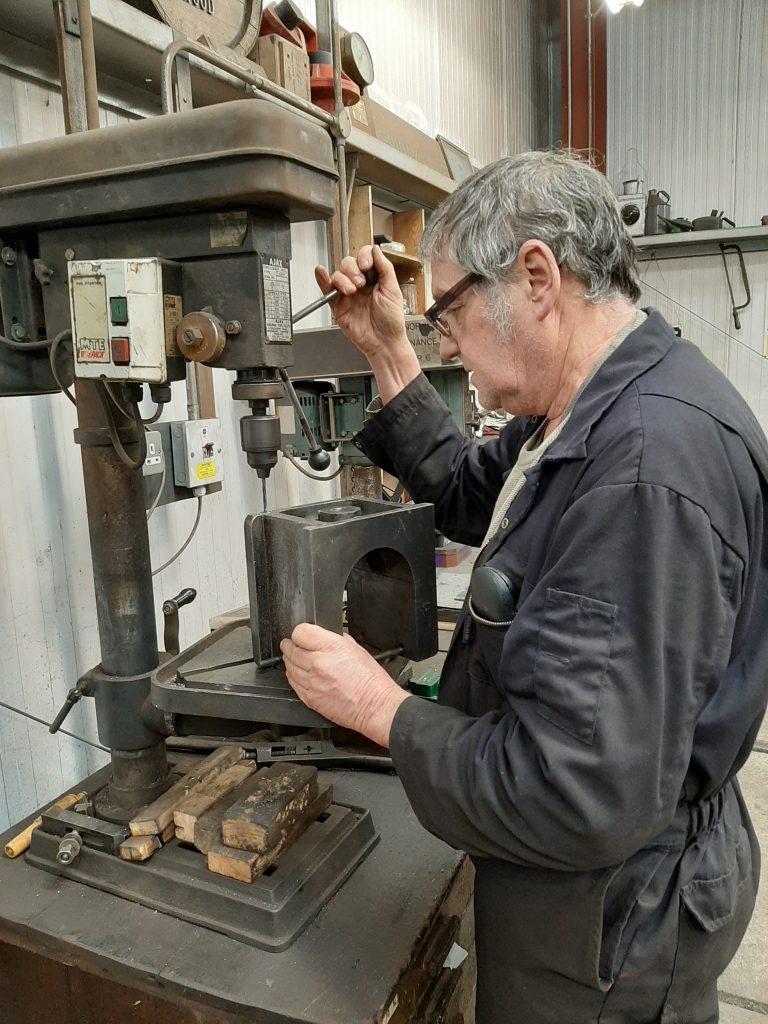 Keith working on one of Fluff's axleboxes