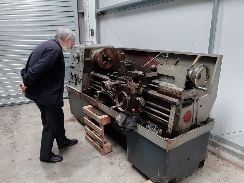 Alan inspecting the new lathe