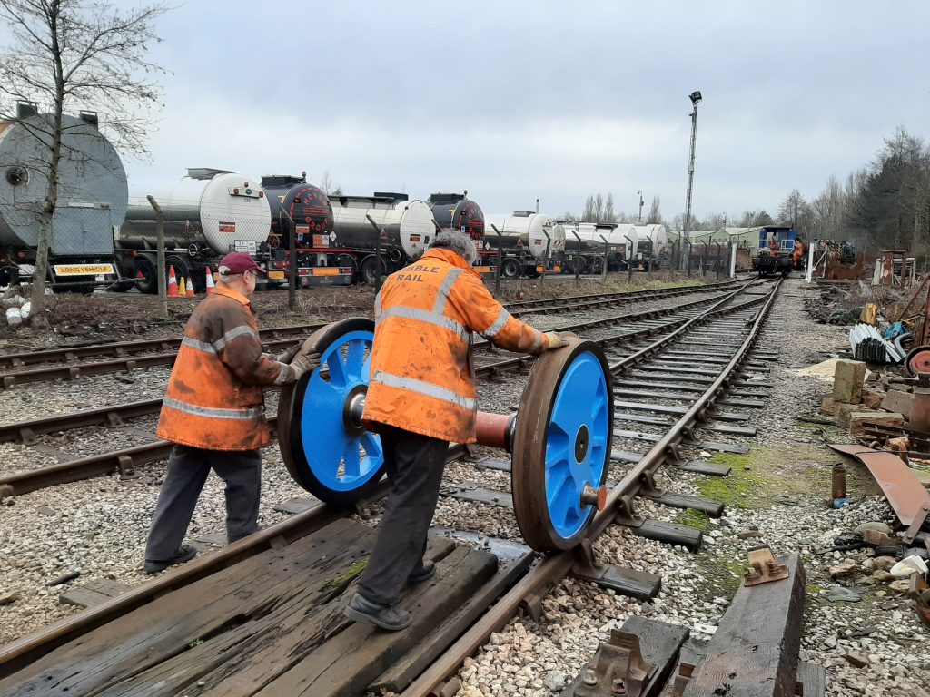 John Dixon and Keith Brewer hand shunt Caliban's wheels