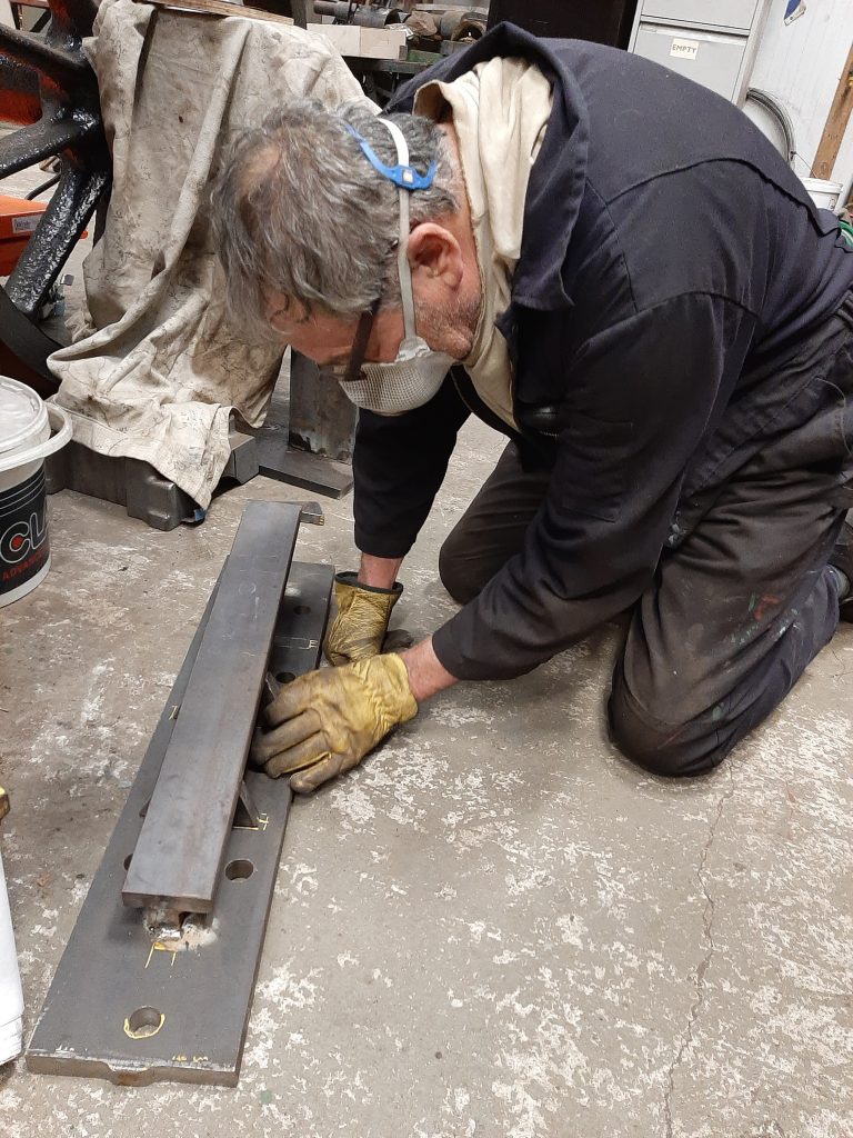 Keith preparing the base plate for Wootton Hall's screw reverser for welding